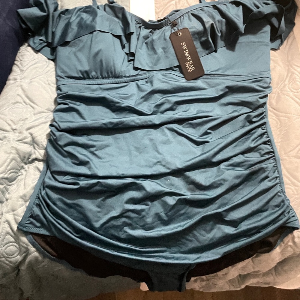 Medium Citychic swimsuit in a dark teal you can wear straps in different ways.